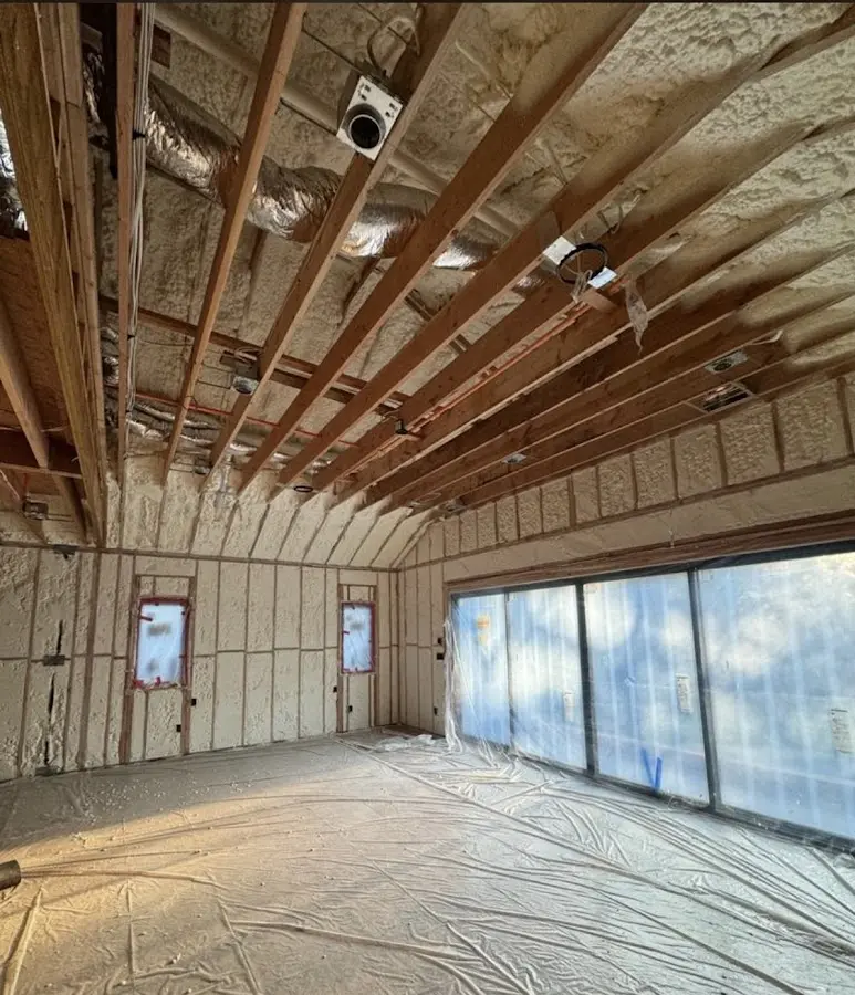 Interior walls and ceiling insulated with spray foam during new construction in Taylor